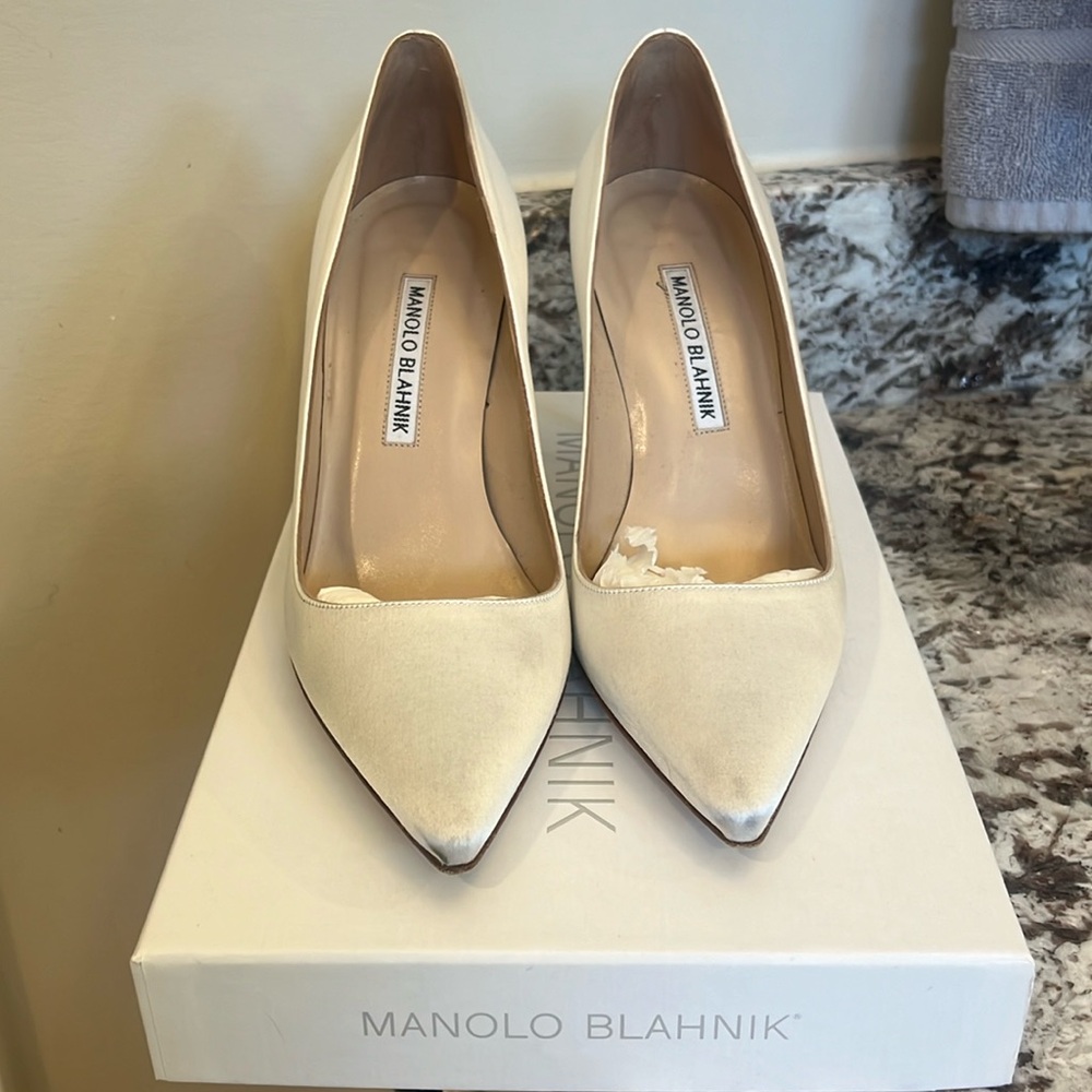 Manolo Blahnik white stain pumps